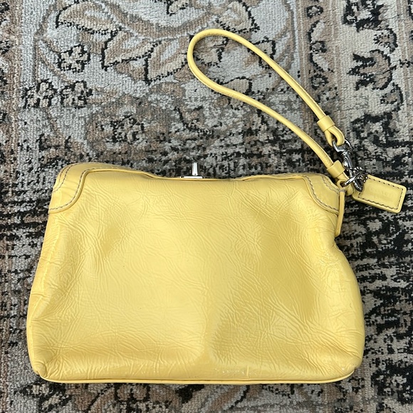 Coach yellow patent leather clutch with silver hardware! - Picture 3 of 6
